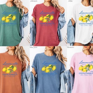 a woman wearing a t - shirt with lemons on it