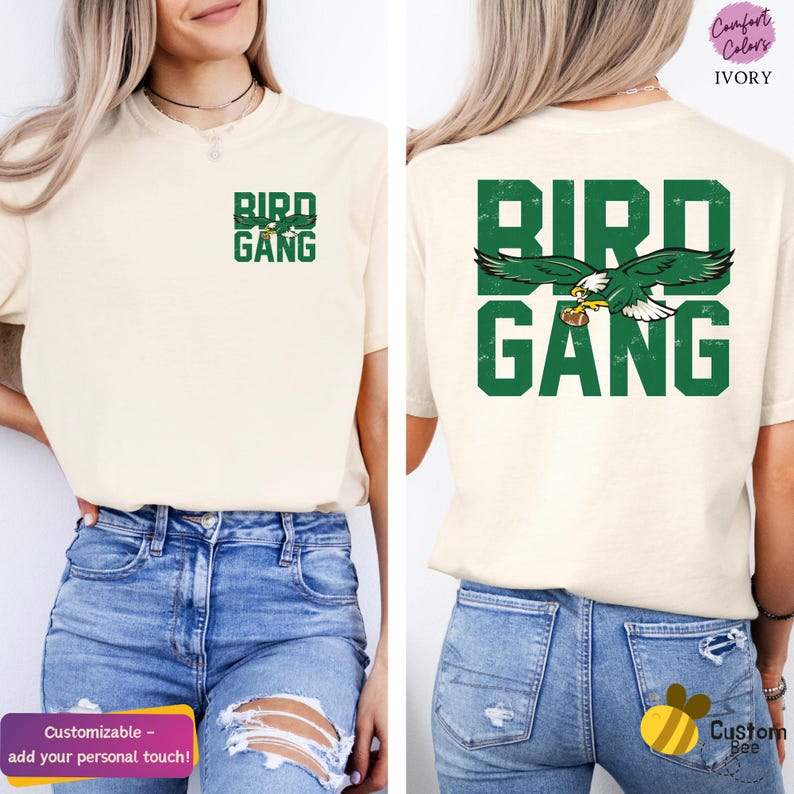 a woman wearing a bird gang t - shirt