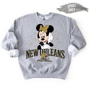 A grey sweatshirt with a graphic of Minnie Mouse and text that says "NEW JERSEY FOOTBALL".
