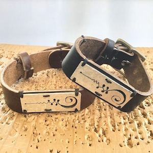 Sterling silver and Horween  bracelet with Unalome Symbol