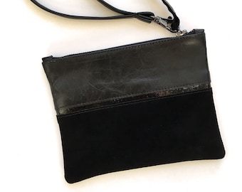 Black Divide zip pouch writlet. Repurposed black leather and suede with patent leather stripe, gunmetal zipper, fully lined.
