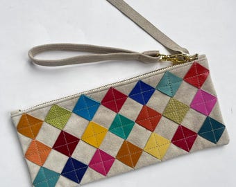 Multi color on tan leather diamond zip pouch, large. Repurposed multi leather diamond chips on tan suede, gold zipper, fully lined.
