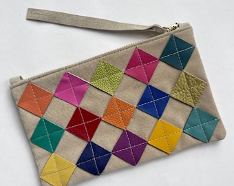 Multi color on tan leather diamond zip pouch, small. Repurposed multi leather diamond chips on tan suede, gold zipper, fully lined.