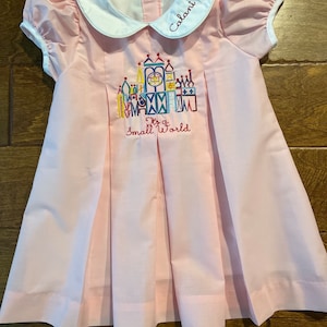 Magic Mouse Small World Embroidered Pleat Dress