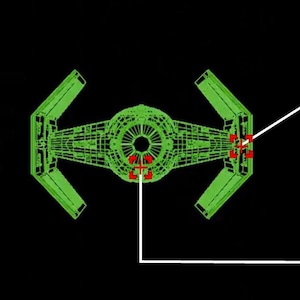May include: A green TIE fighter spaceship with a black cockpit. The image includes text in a fictional language, which reads: "MYKSM7 ΔΙ 1475 EM7771YM CO1YKV07 MC31771710 100 OF DAE ペロロフロロ10 MAM7X KX770K7M. ZARAR EMMER ON 771YM VKM DMM7K+7, ロフK10 △70K77 KW7 KOYM7KOV ミミ フラメツイート"