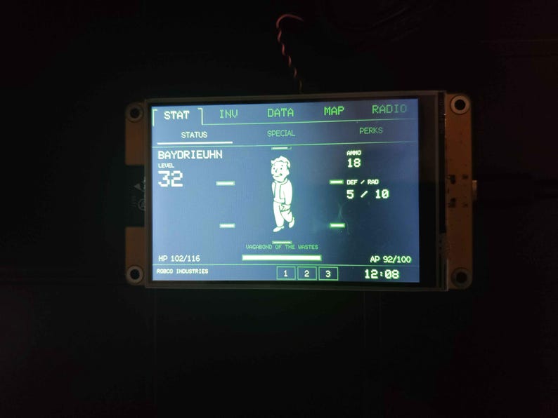 4-inch Pip-Boy-inspired touchscreen electronics displaying a Fallout-style STAT screen