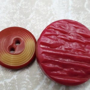Vintage Buttons - 2 cream and raspberry abstract design celluloid, large 1&quot;, and 3/4&quot; (oct 299 21)
