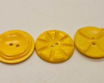 Vintage buttons, 3 large assorted yellow designs large  1 1/8" 28mm plastic buttons sew thru  (apr 54 24)
