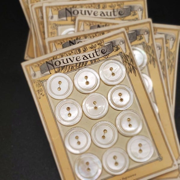 Vintage Buttons - mother of pearl 12 matching NOUVEAUTE  France 2 hole, ringer edge on 1 Card small size 9/16 inch 14mm (sept 189 22)