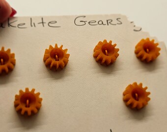 Vintage Buttons- Lot of 6, small butterscotch carved Bakelite, wheel cogged, gears,7/16" 11mm (apr 144 24)