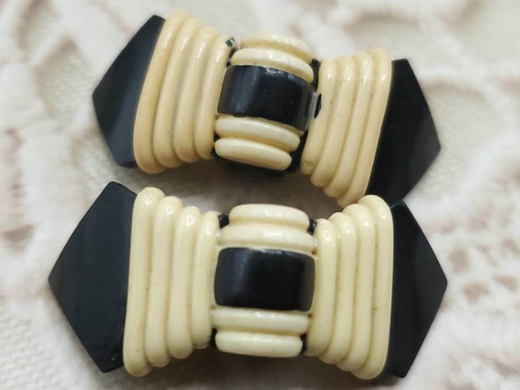 Vintage shoe clips, Black and cream celluloid bow… - image 1
