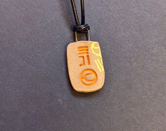 Stone Protection Talisman (Red and Yellow)