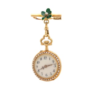 Reloj con broche colgante de esmalte en oro amarillo de 18 k con perla y diamantes antiguos
