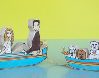 Custom Wedding Cake Topper Couple in Row Boat, Canoe or Kayak with Separate Boat for Three Pets