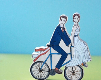 Custom Wedding Cake Topper Couple on Bike with One on the Handlebars and Ribbons, One-sided