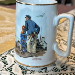 Norman Rockwell “Looking Out to Sea” Collector Mug – 1985 – Made in Japan – Gold Trim – 4.5” Tall