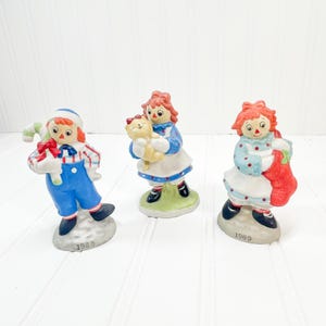 Vintage Ceramic Christmas Raggedy Ann and Andy Doll Figurine Set of 3 1989