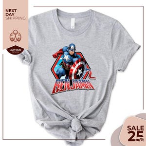 a gray t - shirt with a captain america graphic on it