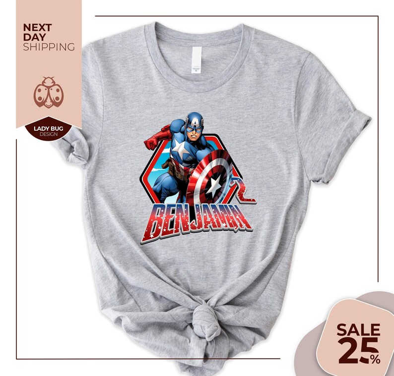 a gray t - shirt with a captain america graphic on it