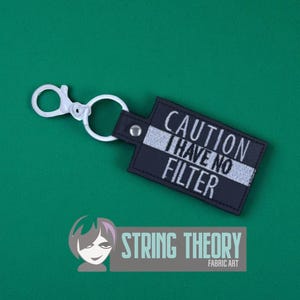 Varning, jag har inget filter ITH i bågen. Tryckknappsnyckelring. Maskinbroderimönster för 4x4-båge.