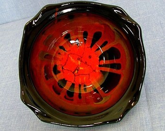 Vintage 1960s California Art Pottery Bowl Black with a Sun Burst of Color