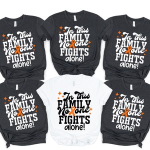 In This Family No One Fights Alone Shirt, Family Cancer Fight Shirt, Family Leukemia Shirt, Custom family support, MS Awareness Tee