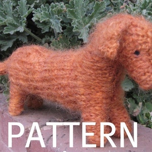 May include: A knitted brown dachshund dog toy. The toy is made with a fluffy yarn and has a realistic appearance.