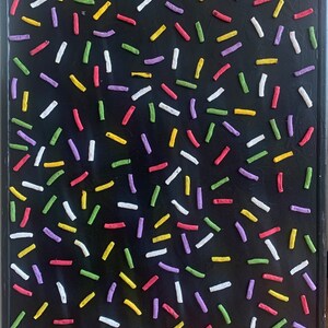 May include: A black background with a random pattern of colorful, thin, rectangular shapes. The shapes are in shades of red, yellow, green, white, and purple.