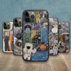 May include: Several phone cases with space-themed designs. The cases feature astronauts, planets, rockets, and text including "HAIL MARY" and "ANDY WEIR". The colour palette includes blue, orange, and white, creating a collage effect.