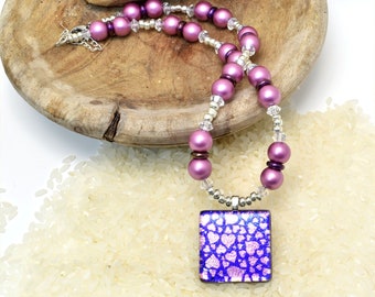 Fused glass square pendant in purple with a pink heart design, beaded necklace