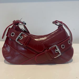 Burgundy red leather buckle bag