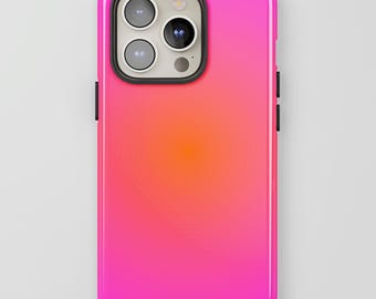 May include: A vibrant pink and orange gradient phone case. The case has a glossy finish and a black camera module. The design transitions from a bright pink at the bottom to a warm orange in the center.