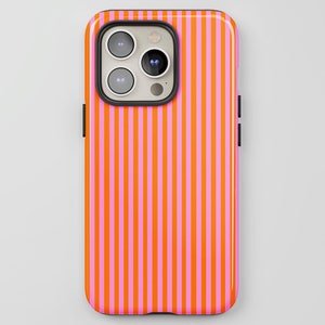 May include: A smartphone case featuring a bold design of vertical stripes in alternating pink and orange. The case has a glossy finish and black detailing around the camera and edges. The phone case is set against a white backdrop.