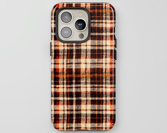 Puede incluir: Una funda de teléfono negra con un patrón de cuadros rojos, naranjas y blancos.