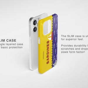 May include: A yellow phone case with a blue and white design featuring the text "ORIGINAL SARDINES". The case is designed to fit a smartphone with a camera bump.