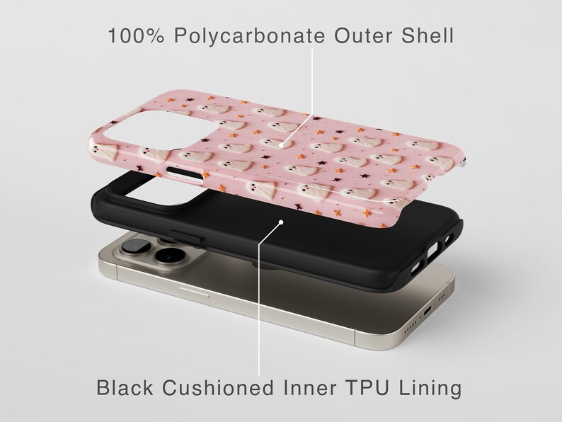 May include: A pink phone case with a ghost pattern and the text "100% Polycarbonate Outer Shell". The case is shown with a black cushioned inner TPU lining and a gold phone.