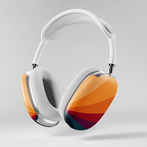 May include: White over-ear headphones with a colorful, striped design on the earcups. The earcups feature a gradient of orange, yellow, red, and blue. The headband and ear cushions are white, and the frame is silver.