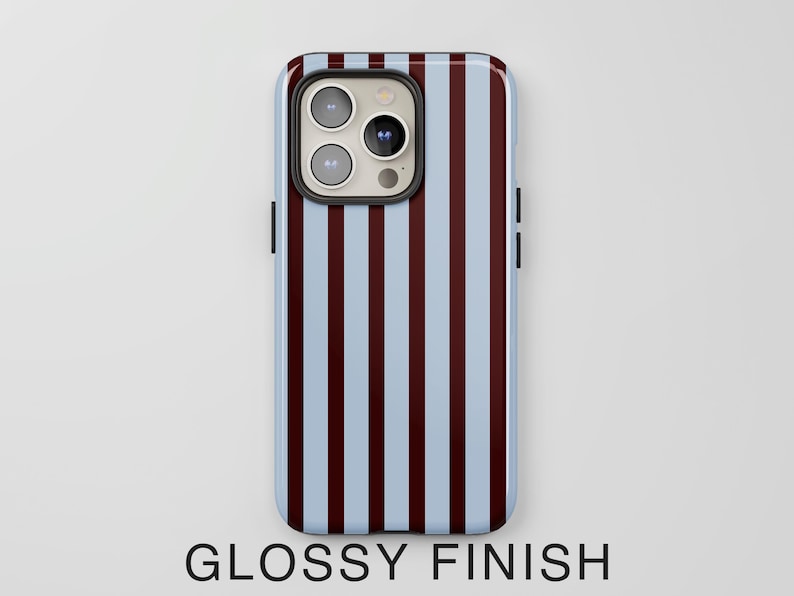 May include: A smartphone case with a glossy finish. The case features a pattern of vertical stripes in light blue and maroon. The phone's camera and buttons are visible. The text "GLOSSY FINISH" is at the bottom.