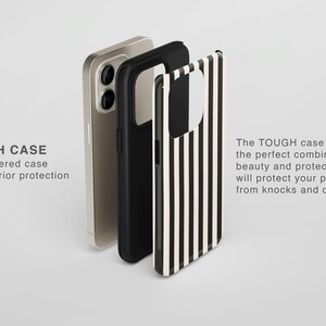 May include: A black and white striped phone case with a clear back and a black bumper. The case is designed to protect your phone from drops and knocks. The text "TOUGH CASE" is visible in the image.