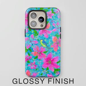 May include: A glossy phone case featuring a vibrant floral design with pink flowers, green leaves, and a blue bird against a turquoise background. The text "GLOSSY FINISH" is displayed at the bottom.