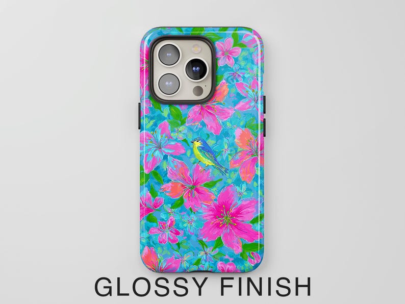 May include: A glossy phone case featuring a vibrant floral design with pink flowers, green leaves, and a blue bird against a turquoise background. The text "GLOSSY FINISH" is displayed at the bottom.