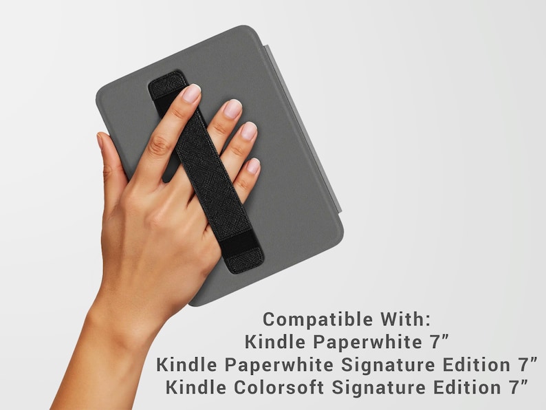May include: A gray Kindle Paperwhite case with a black hand strap. The text on the image reads: Compatible With: Kindle Paperwhite 7", Kindle Paperwhite Signature Edition 7", Kindle Colorsoft Signature Edition 7".