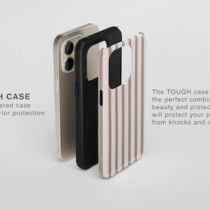 May include: Three phone cases: a gold, a black, and a striped beige and white. The striped case has vertical lines. The text "TOUGH CASE" and "Dual layered case for superior protection" is visible.