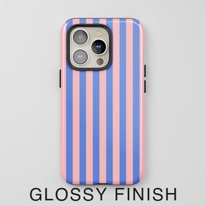 May include: A pink and blue striped phone case with a glossy finish.
