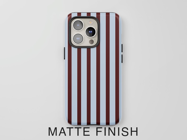May include: A smartphone case with a matte finish. The case features a vertical striped pattern in light blue and burgundy. The text "MATTE FINISH" is printed at the bottom of the case.
