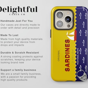 May include: A yellow phone case with a blue and white sardine can design. The can says "ORIGINAL SARDINES In Olive Oil TRADITIONAL RECIPE".