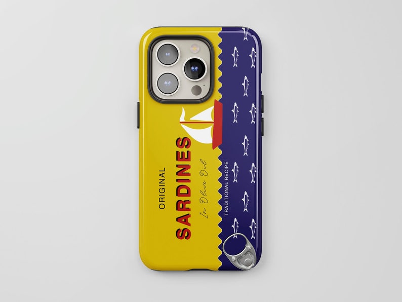 May include: A yellow and blue phone case with a design that looks like a can of sardines. The can says "ORIGINAL SARDINES In Olive Oil" and "TRADITIONAL RECIPE".