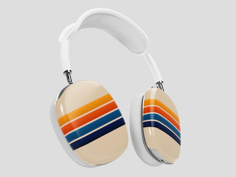 May include: Cream-colored over-ear headphones with a white headband and ear cushions. The earcups feature a retro design with orange, red, and blue stripes. The headphones have a modern, sleek design.