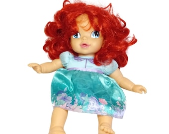 Muñeca infantil de lujo Jakks Pacific Disney Princess Baby Ariel La Sirenita LEER