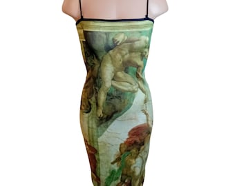 May include: A bodycon dress featuring a print of Michelangelo's "The Creation of Adam" on a mannequin. The dress has thin black straps and a square neckline. The artwork is in shades of green, beige, and red.